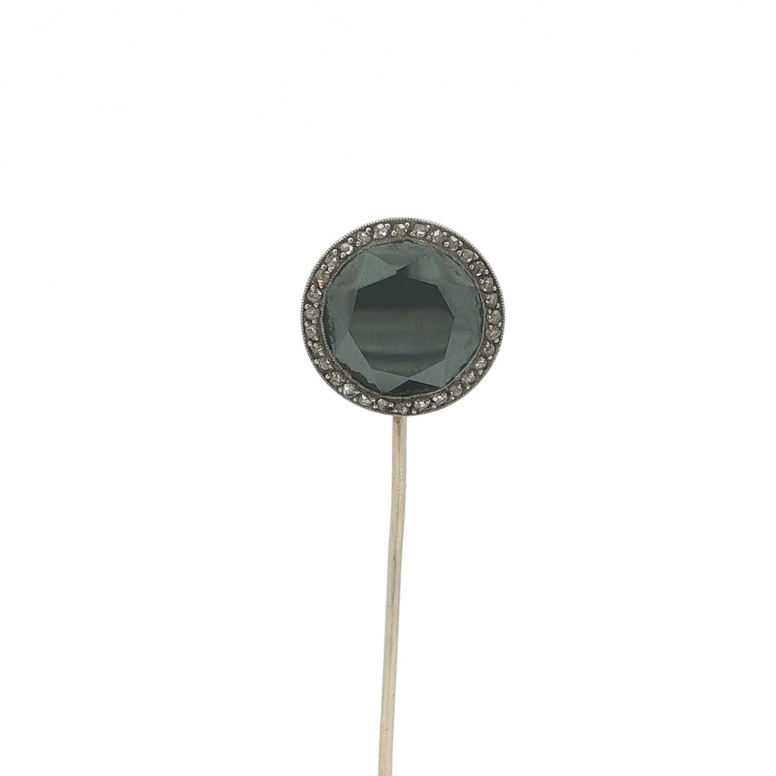 Cartier Edwardian stick pin with round hematite and 3 old cut diamonds: Cartier Edwardian stick pin with round hematite and 3 old cut diamonds Antique Edwardian stick pin by Cartier featuring a round natural hematite accented with three old rose cut diamonds. Crafted in s