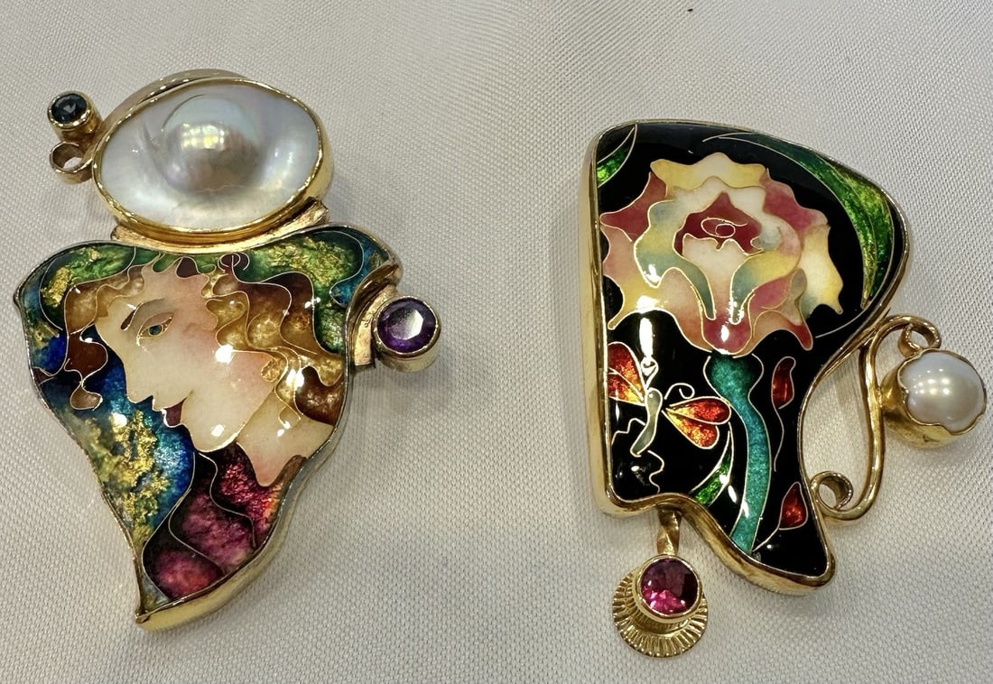 Pair of Russian enamel brooch pendants with topaz tourmaline pearl amethyst: Pair of Russian enamel brooch pendants with topaz tourmaline pearl amethyst Set of two Russian brooches that can also be worn as pendants. These pre-owned pieces are crafted in yellow gold, sterling s