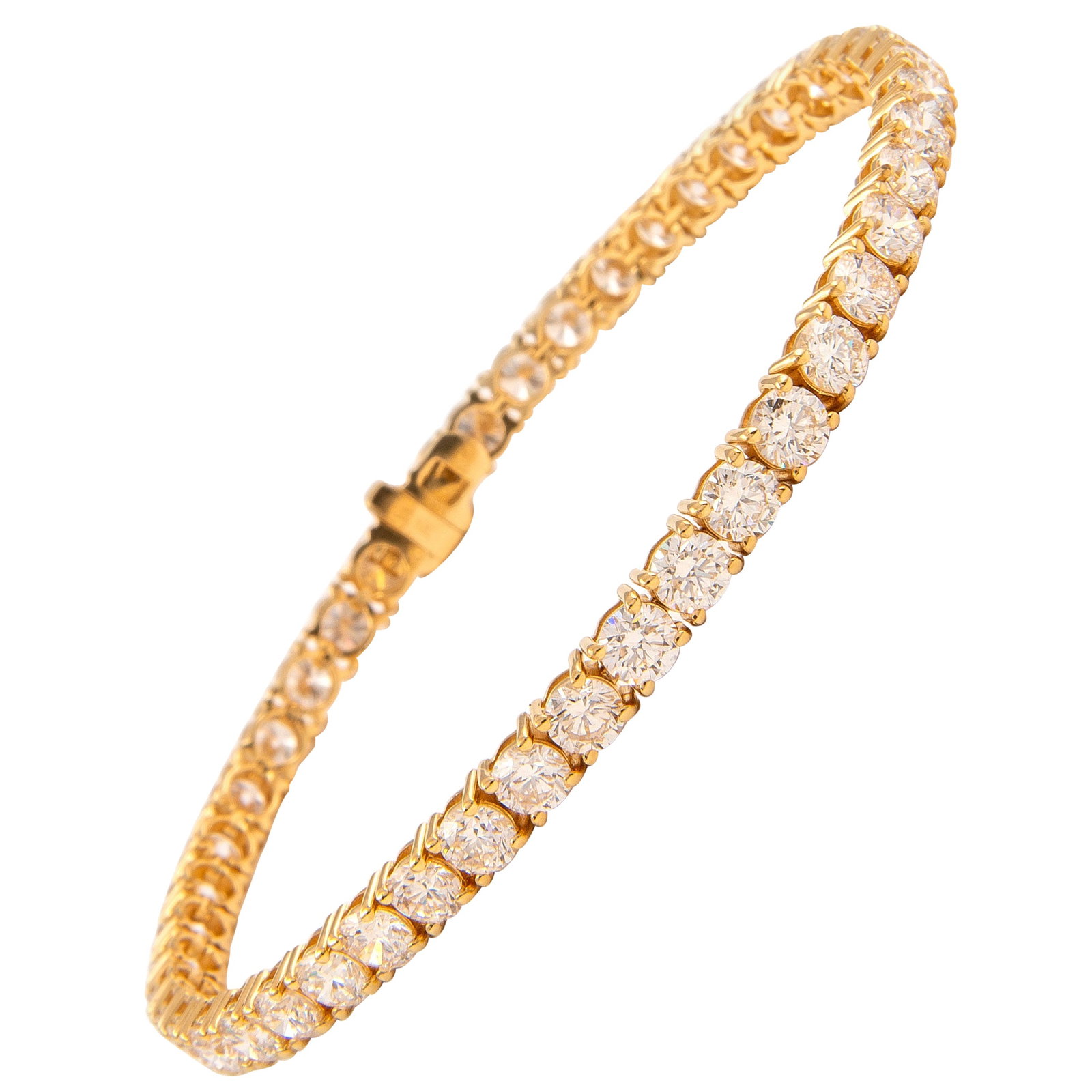 Diamond Tennis Bracelet 9.06ct 18k Yellow Gold: Diamond Tennis Bracelet 9.06ct 18k Yellow Gold Diamond tennis bracelet set with 42 round brilliant diamonds totaling 9.06 ct. The diamonds are approximately H color and VS clarity, four-prong set in 1