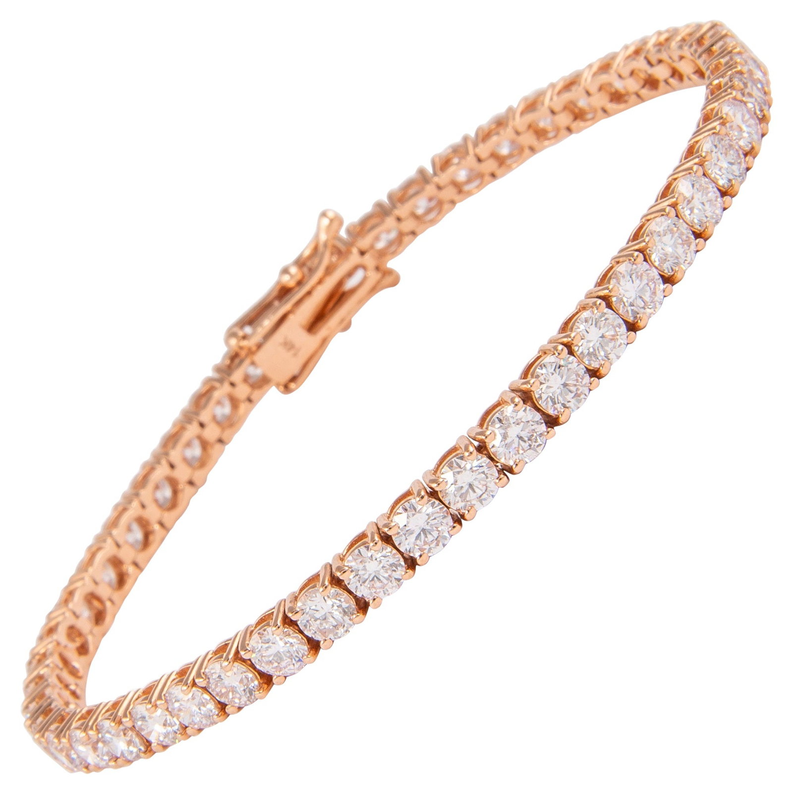 14k Rose Gold 7.92ct Diamond Tennis Bracelet: 14k Rose Gold 7.92ct Diamond Tennis Bracelet Diamond tennis bracelet set with 47 round brilliant white diamonds totaling 7.92 ct in a four-prong 14k rose gold setting. This modern bracelet is an un-us