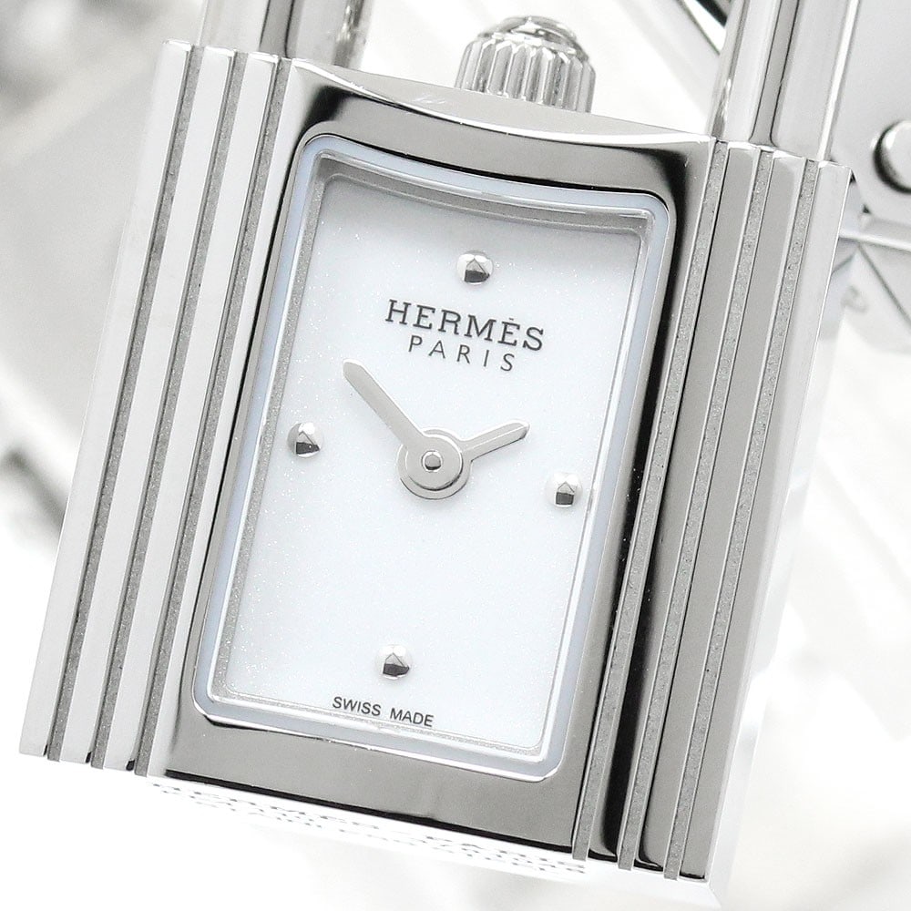 HERMES Kelly Watch KE4.110 Women's Quartz Wristwatch White Dial: HERMES Kelly Watch KE4.110 Women's Quartz Wristwatch White Dial Hermes Kelly Watch quartz wristwatch for women. This Swiss-made model features a white dial and stainless steel case and bracelet. It in