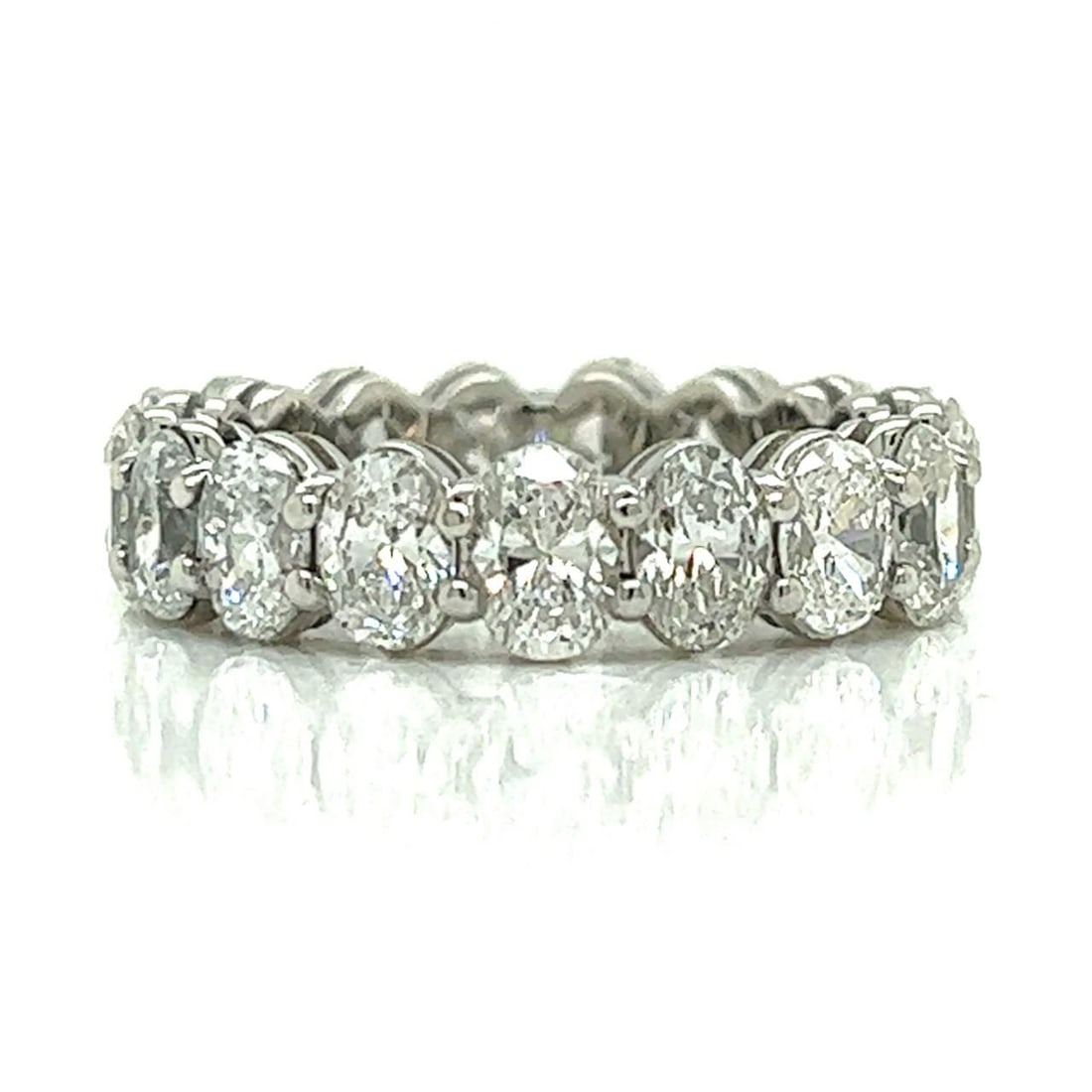 Platinum Diamond Eternity Band 5.90 Ct 17 Oval Diamonds F-G VVS-VS: Platinum Diamond Eternity Band 5.90 Ct 17 Oval Diamonds F-G VVS-VS This exquisite Platinum Diamond Eternity Band features a total diamond weight of approximately 5.90 Ct, showcasing 17 stunning oval d