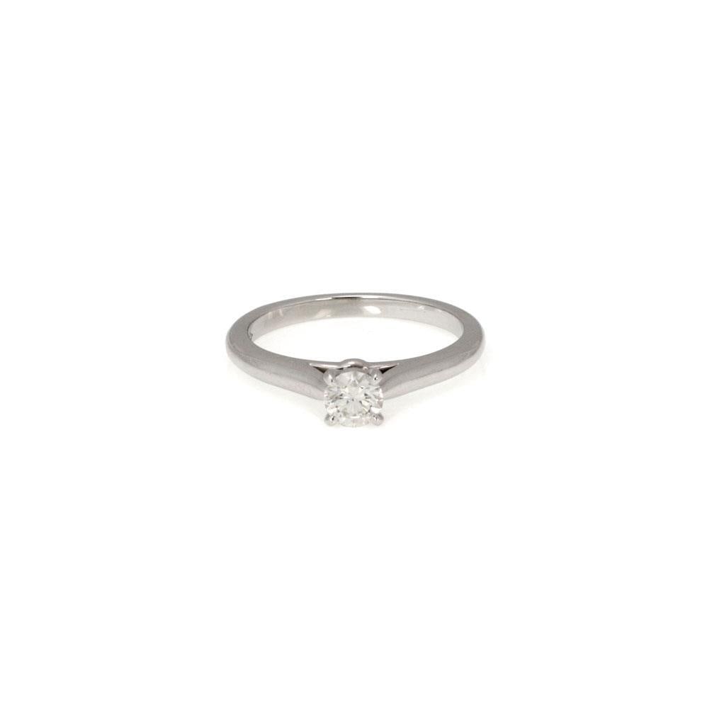 Cartier Platinum Solitaire Ring 0.23ct F VS1 Diamond with GIA Certificate: Cartier Platinum Solitaire Ring 0.23ct F VS1 Diamond with GIA Certificate This exquisite Cartier engagement ring showcases a stunning 0.23ct round cut diamond, graded F for color and VS1 for clarity, 
