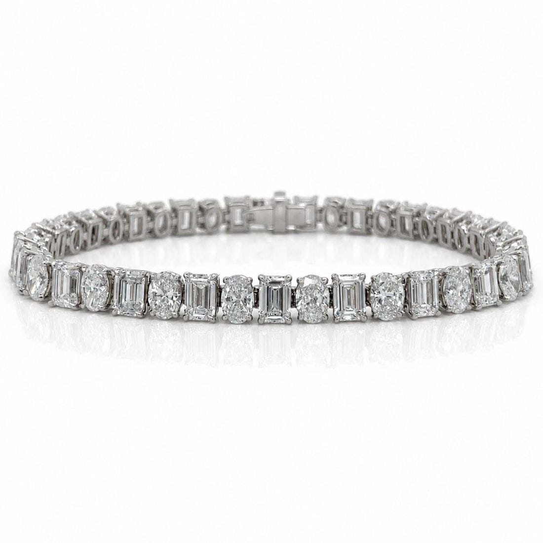 GIA Certified 15.10 Ct Diamond Tennis Bracelet in Platinum: GIA Certified 15.10 Ct Diamond Tennis Bracelet in Platinum Pre-owned platinum tennis bracelet set with 42 GIA certified diamonds totaling 15.10 ct. The diamonds are graded D-F color and VVS1-VS2 clari
