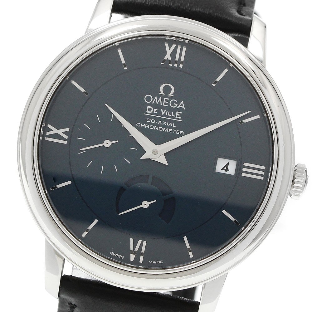 OMEGA De Ville Prestige automatic wristwatch ref 424.13.40.21.03.001 date power reserve: OMEGA De Ville Prestige automatic wristwatch ref 424.13.40.21.03.001 date power reserve OMEGA De Ville Prestige automatic wristwatch with a navy dial and stainless steel case. This men's watch feature