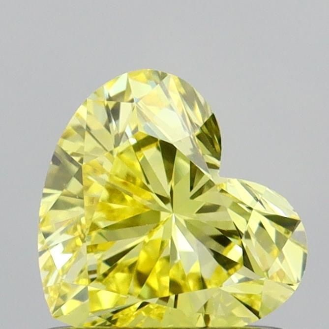 Loose Diamond - HEART 0.68ct Fancy Vivid Yellow VS1: Loose Diamond - HEART 0.68ct Fancy Vivid Yellow VS1 Source: This is a real non-mined Diamond that has been grown in a lab Shape: HEART Carats: 0.68 Color: Fancy Vivid Yellow Certification: IGI Video: