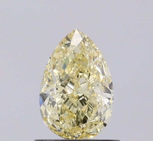 Loose Diamond - PEAR 1.02ct Fancy Yellow VS1: Loose Diamond - PEAR 1.02ct Fancy Yellow VS1 Source: This is a real non-mined Diamond that has been grown in a lab Shape: PEAR Carats: 1.02 Color: Fancy Yellow Certification: IGI Video: