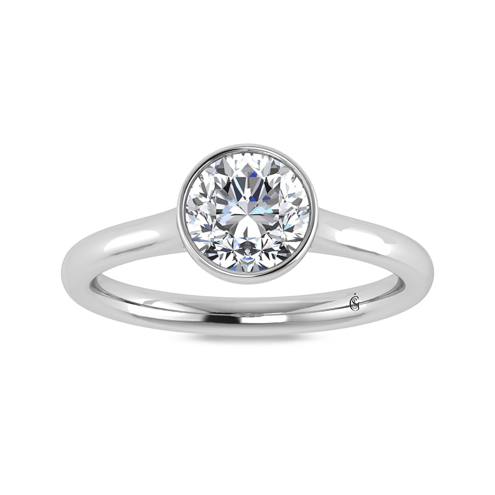 14K White Gold Lab Grown Bezel Set Lab Grown Diamond 3/4 ct.tw. Solitaire Ring: 14K White Gold Lab Grown Bezel Set Lab Grown Diamond 3/4 ct.tw. Solitaire Ring Crafted in 14K white gold, this solitaire ring features 3/4 CT TW of bezel-set lab-grown diamonds. A modern yet classic d