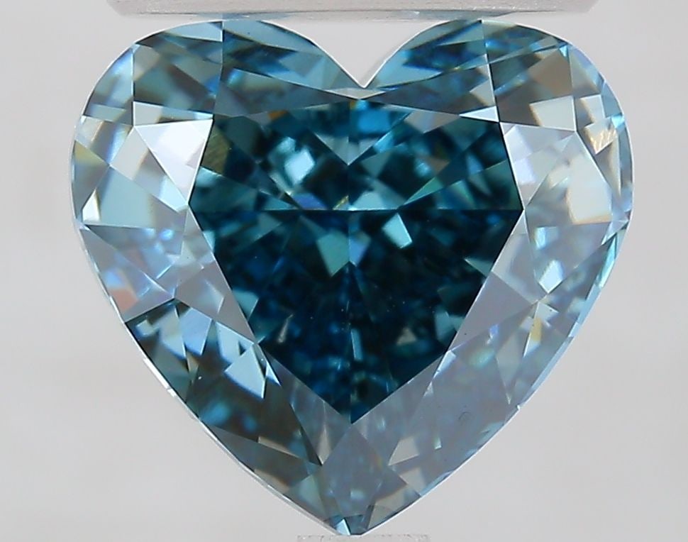 Loose Diamond - HEART 2.7ct Fancy Vivid Blue VVS2: Loose Diamond - HEART 2.7ct Fancy Vivid Blue VVS2 Source: This is a real non-mined Diamond that has been grown in a lab Shape: HEART Carats: 2.7 Color: Fancy Vivid Blue Certification: IGI Video: