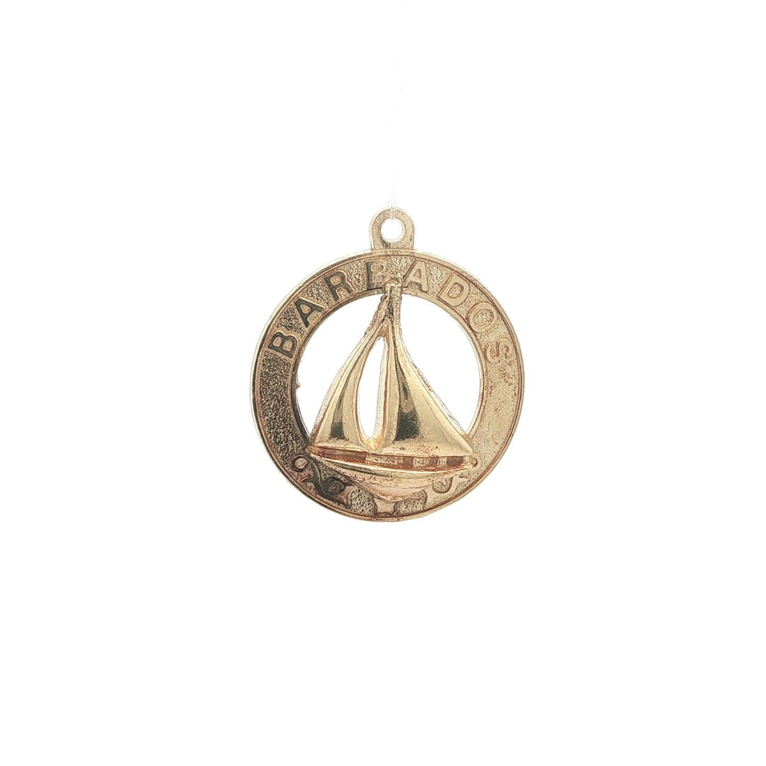 14k Yellow Gold Barbados Sailboat Round Pendant Charm: 14k Yellow Gold Barbados Sailboat Round Pendant Charm Vintage round charm pendant featuring a Barbados sailboat design in solid 14k yellow gold. This collectible pendant has no stone and retains its o