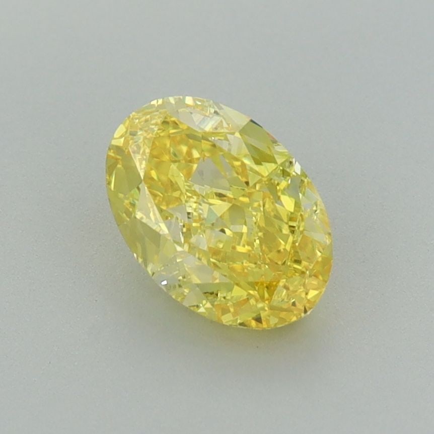 Loose Diamond - OVAL 1.02ct Fancy Vivid Yellow VVS1: Loose Diamond - OVAL 1.02ct Fancy Vivid Yellow VVS1 Source: This is a real non-mined Diamond that has been grown in a lab Shape: OVAL Carats: 1.02 Color: Fancy Vivid Yellow Certification: IGI Video: