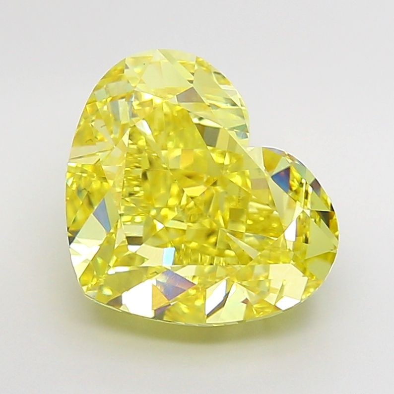 Loose Diamond - HEART 7.06ct Fancy Vivid Yellow VS1: Loose Diamond - HEART 7.06ct Fancy Vivid Yellow VS1 Source: This is a real non-mined Diamond that has been grown in a lab Shape: HEART Carats: 7.06 Color: Fancy Vivid Yellow Certification: IGI Video: