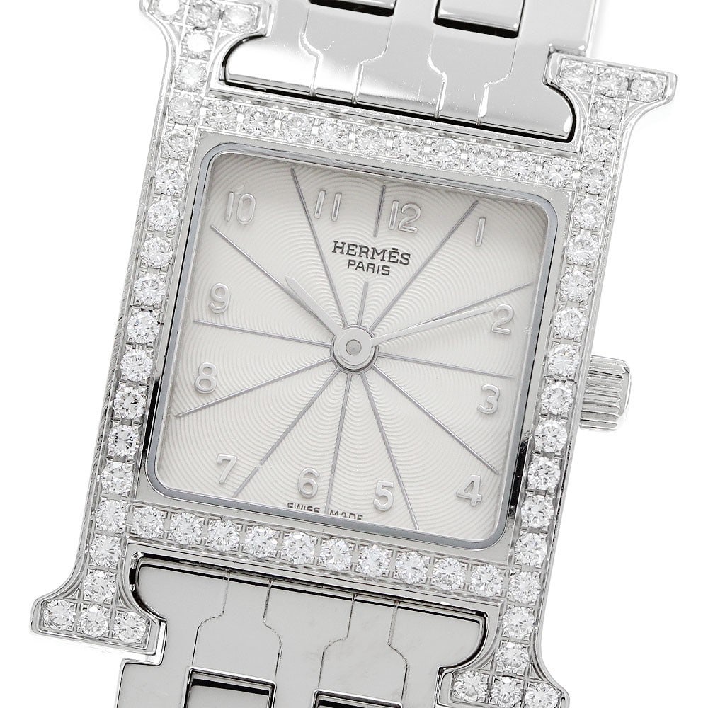 Hermes H Watch HH1.230 Womens Quartz Wristwatch Diamond Bezel: Hermes H Watch HH1.230 Womens Quartz Wristwatch Diamond Bezel Hermes H Watch women's wristwatch with a diamond bezel and quartz movement. This watch features a silver dial in a stainless steel case wi