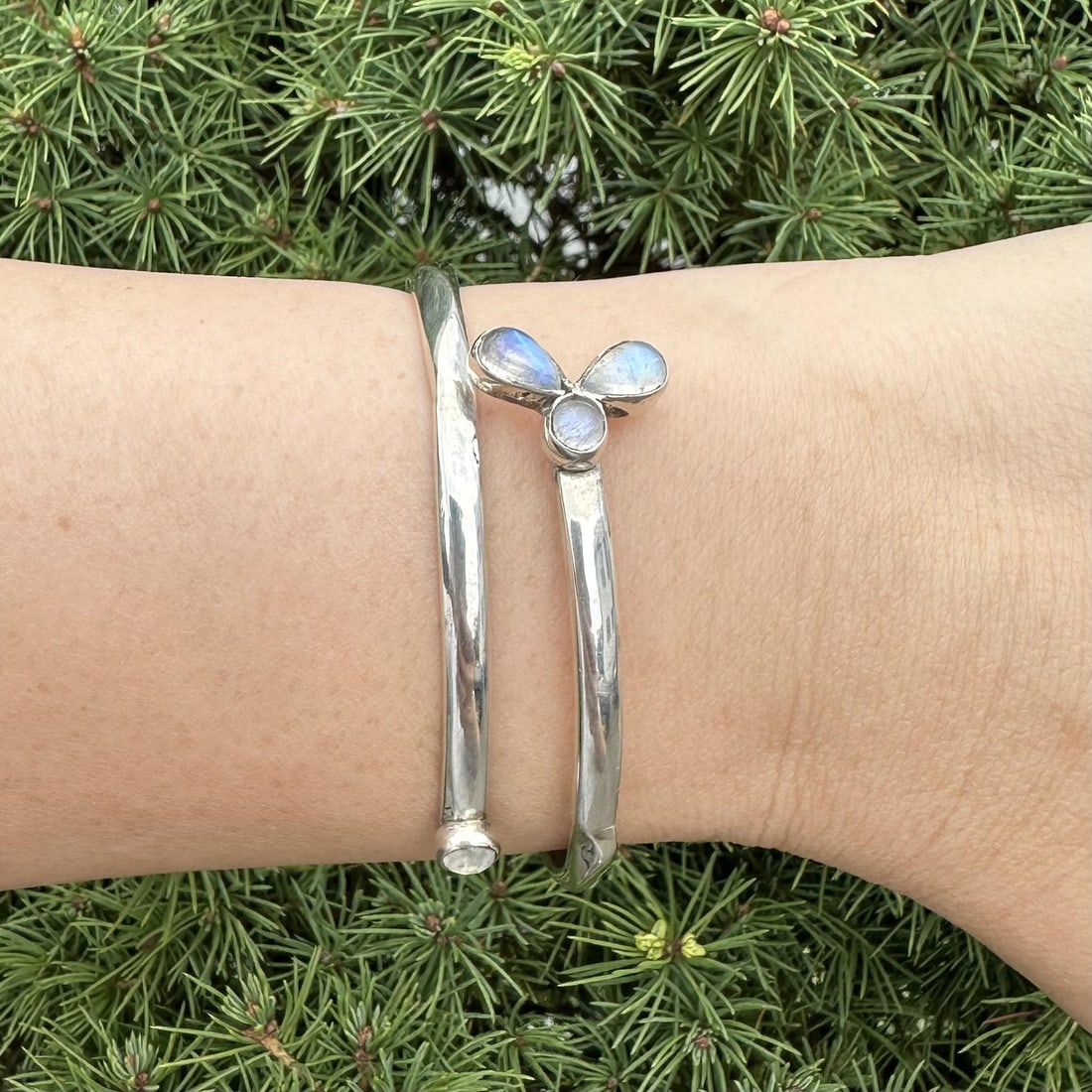 Sterling Silver Hinged Bangle Bracelet with 4 Moonstone Flower Bypass Design: Sterling Silver Hinged Bangle Bracelet with 4 Moonstone Flower Bypass Design Handmade sterling silver hinged cuff bangle bracelet featuring a bypass design with flower detailing and four natural moons