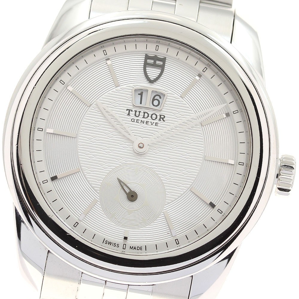 TUDOR Glamour 57000 mens automatic stainless steel wristwatch: TUDOR Glamour 57000 mens automatic stainless steel wristwatch TUDOR Glamour Double Date automatic men's wristwatch with a silver dial, stainless steel case, and stainless steel bracelet. Features incl