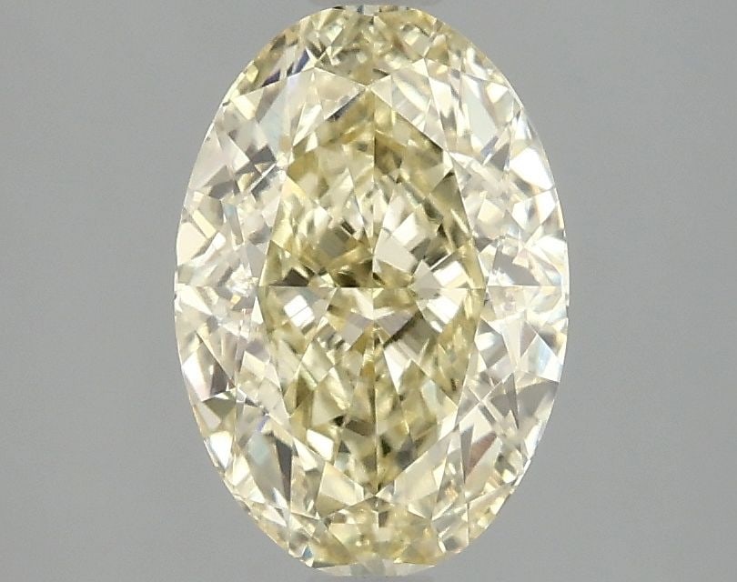 Loose Diamond - OVAL 2.06ct Fancy Vivid Yellow VVS2: Loose Diamond - OVAL 2.06ct Fancy Vivid Yellow VVS2 Source: This is a real non-mined Diamond that has been grown in a lab Shape: OVAL Carats: 2.06 Color: Fancy Vivid Yellow Certification: IGI Video: