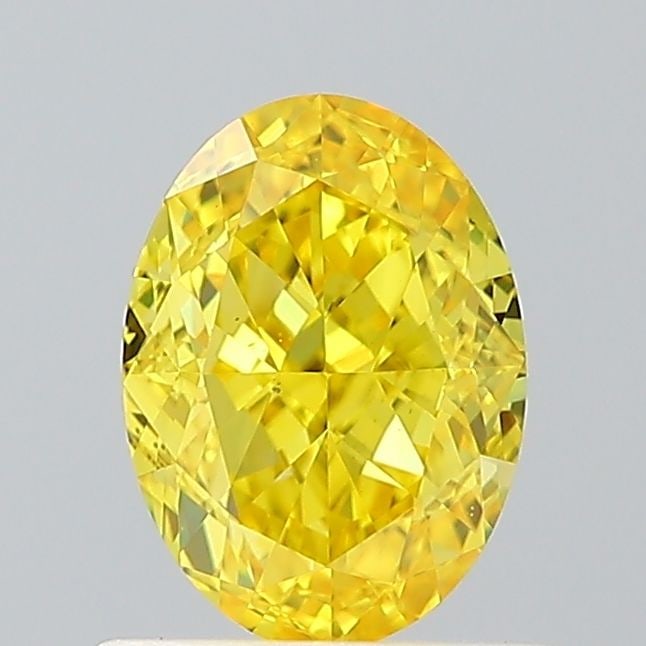 Loose Diamond - OVAL 1.02ct Fancy Vivid Yellow VS2: Loose Diamond - OVAL 1.02ct Fancy Vivid Yellow VS2 Source: This is a real non-mined Diamond that has been grown in a lab Shape: OVAL Carats: 1.02 Color: Fancy Vivid Yellow Certification: IGI Video: