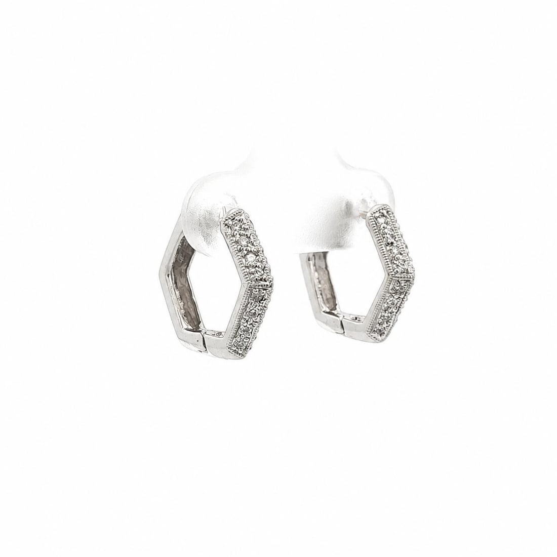 18k White Gold Hexagon Huggie Hoop Earrings with 0.12ctw Pave Diamonds: 18k White Gold Hexagon Huggie Hoop Earrings with 0.12ctw Pave Diamonds Pair of hoop huggie earrings in solid 18k white gold, designed in a hexagon shape and set with natural round brilliant cut pave d