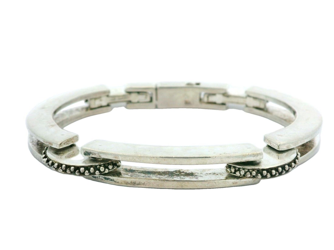 Vintage Sterling Silver Flexible Bead Cuff Bracelet with Push Clasp: Vintage Sterling Silver Flexible Bead Cuff Bracelet with Push Clasp This vintage cuff bracelet showcases a stunning flexible bead texture design crafted from high-quality sterling silver (.925). The b