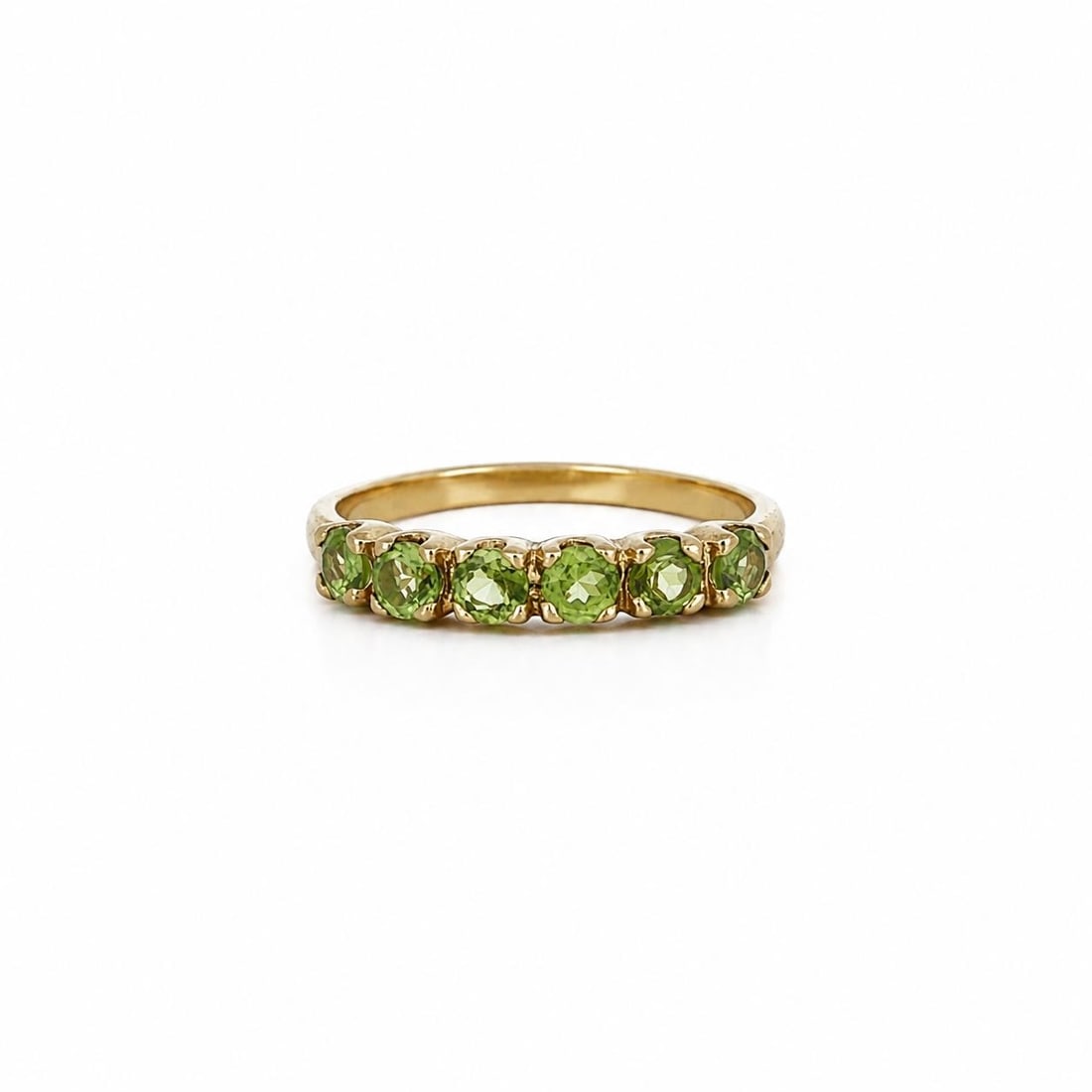 Green Amethyst Band Ring Sterling Silver Gold Plated 0.60ctw Size 6.5: Green Amethyst Band Ring Sterling Silver Gold Plated 0.60ctw Size 6.5 Sterling silver band ring with yellow gold plating, set with six natural green amethysts in a round brilliant cut. This women's ri