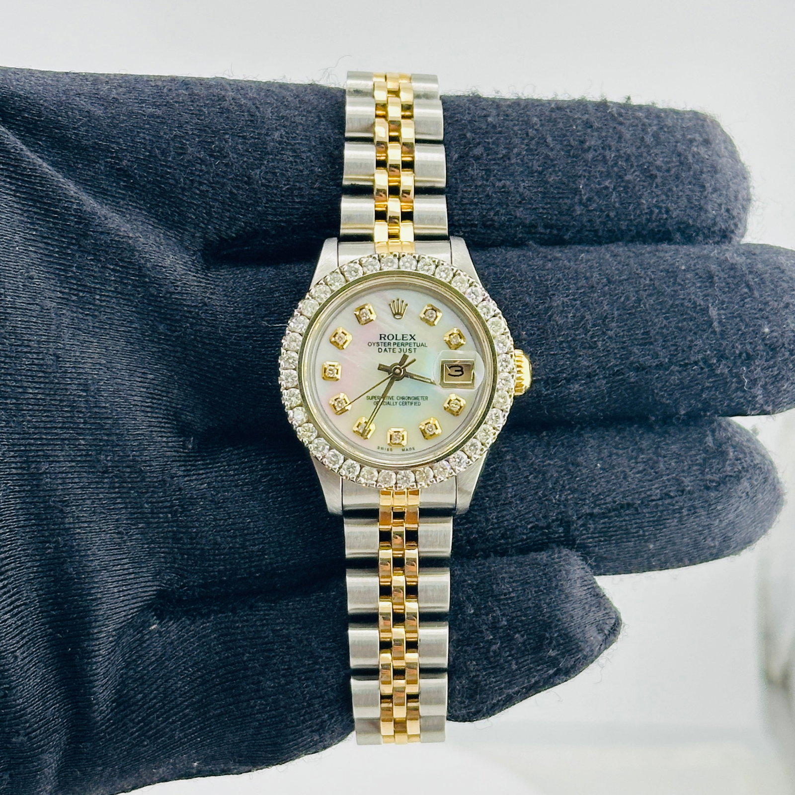 Rolex Datejust Lady Ref 69173 Ladies Watch aftermarket MOP diamond dial: Rolex Datejust Lady Ref 69173 Ladies Watch aftermarket MOP diamond dial Rolex Datejust Lady reference 69173 wristwatch featuring an Aftermarket white mother-of-pearl dial with yellow diamond markers, 
