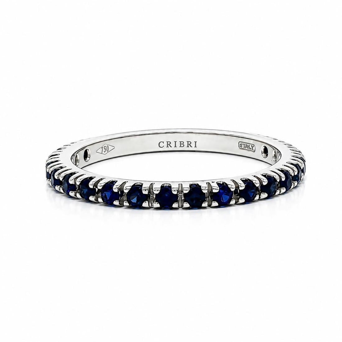 18k White Gold Sapphire Eternity Band Ring 0.74ctw Size 6.5: 18k White Gold Sapphire Eternity Band Ring 0.74ctw Size 6.5 Un-used dainty eternity band ring crafted in solid 18k white gold and set with numerous natural blue sapphires in a round brilliant cut. The