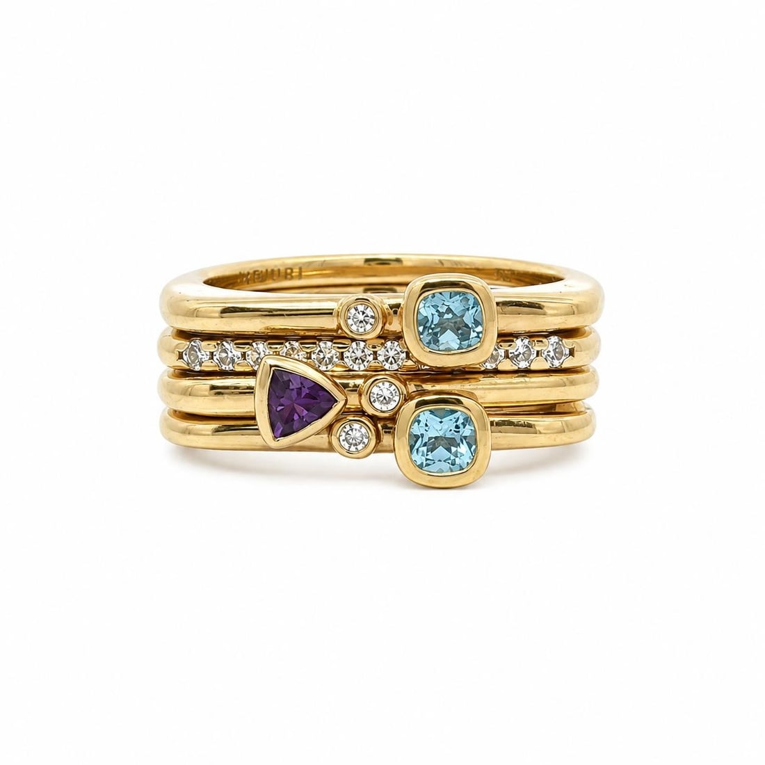 4 Stackable Vermeil Sterling Silver Bands with Amethyst Topaz Sapphires: 4 Stackable Vermeil Sterling Silver Bands with Amethyst Topaz Sapphires Set of 4 puzzle stack band rings featuring a natural amethyst, a blue topaz, and lab grown white sapphires. Crafted in solid ste