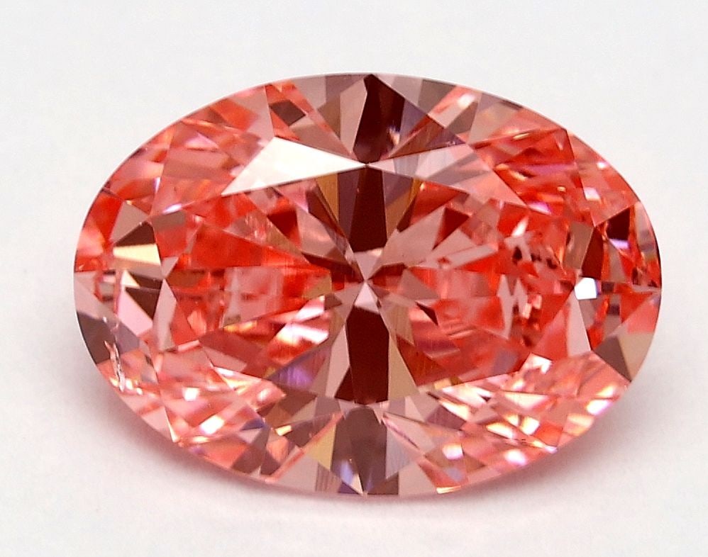 Loose Diamond - OVAL 2.07ct Fancy Vivid Pink SI1: Loose Diamond - OVAL 2.07ct Fancy Vivid Pink SI1 Source: This is a real non-mined Diamond that has been grown in a lab Shape: OVAL Carats: 2.07 Color: Fancy Vivid Pink Certification: IGI Video: Video