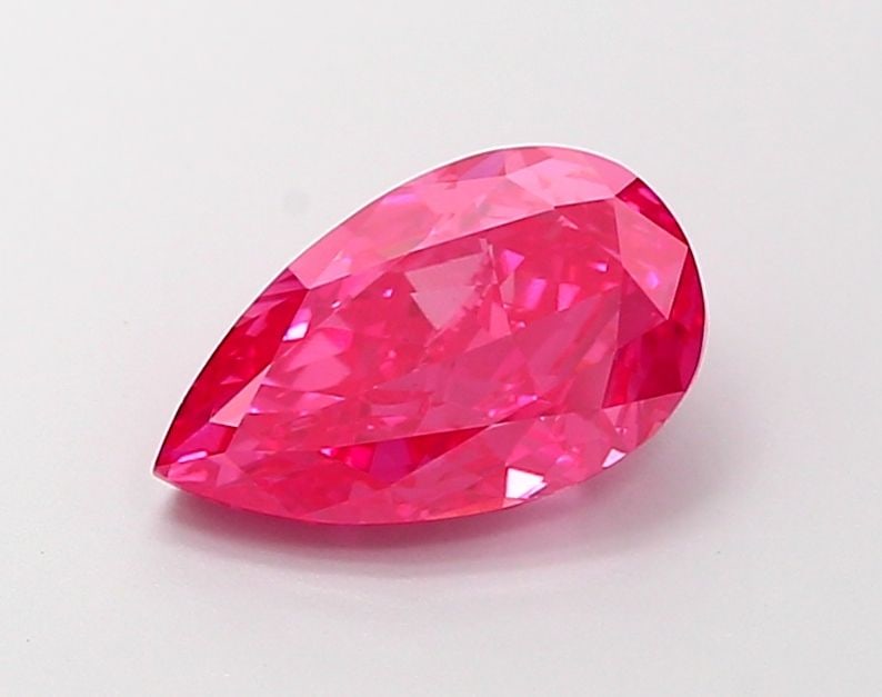 Loose Diamond - PEAR 2.14ct Fancy Vivid Reddish Pink VS1: Loose Diamond - PEAR 2.14ct Fancy Vivid Reddish Pink VS1 Source: This is a real non-mined Diamond that has been grown in a lab Shape: PEAR Carats: 2.14 Color: Fancy Vivid Reddish Pink Certification: I