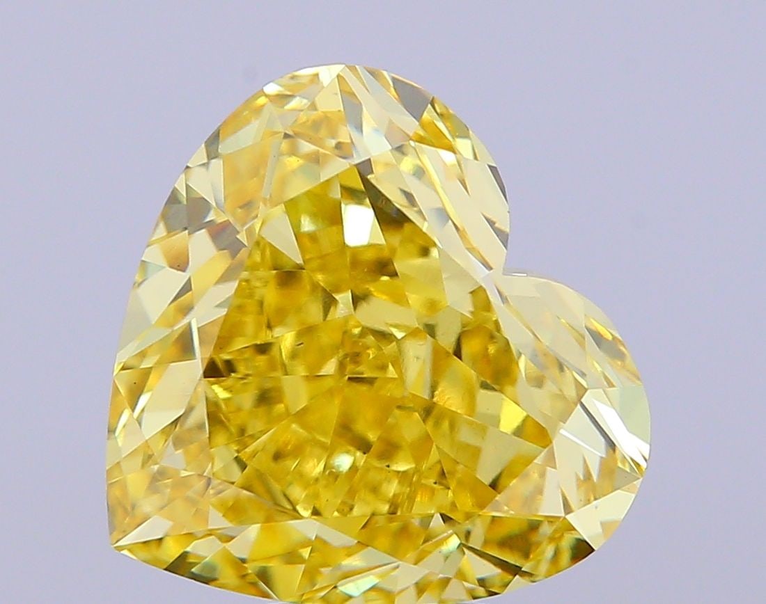 Loose Diamond - HEART 9.03ct Fancy Vivid Yellow VS1: Loose Diamond - HEART 9.03ct Fancy Vivid Yellow VS1 Source: This is a real non-mined Diamond that has been grown in a lab Shape: HEART Carats: 9.03 Color: Fancy Vivid Yellow Certification: IGI Video:
