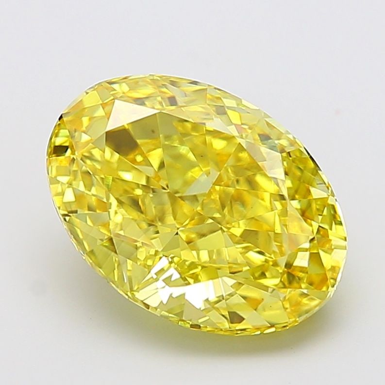 Loose Diamond - OVAL 7.04ct Fancy Vivid Yellow VS2: Loose Diamond - OVAL 7.04ct Fancy Vivid Yellow VS2 Source: This is a real non-mined Diamond that has been grown in a lab Shape: OVAL Carats: 7.04 Color: Fancy Vivid Yellow Certification: IGI Video: