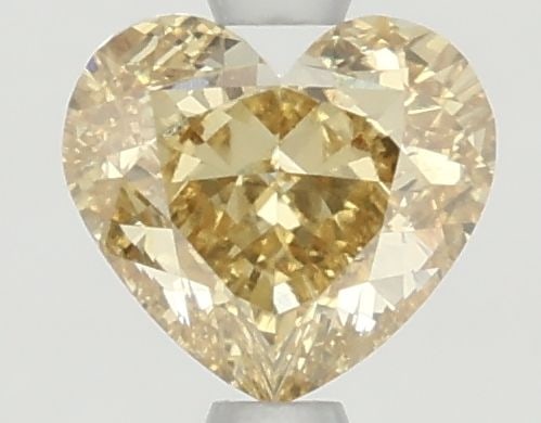 Loose Diamond - HEART 1.36ct Fancy Vivid Yellow VS1: Loose Diamond - HEART 1.36ct Fancy Vivid Yellow VS1 Source: This is a real non-mined Diamond that has been grown in a lab Shape: HEART Carats: 1.36 Color: Fancy Vivid Yellow Certification: NONE Video: