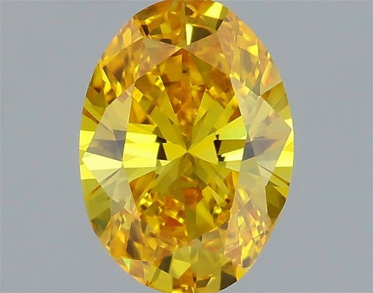 Loose Diamond - OVAL 0.5ct Fancy Vivid Yellow VS1: Loose Diamond - OVAL 0.5ct Fancy Vivid Yellow VS1 Source: This is a real non-mined Diamond that has been grown in a lab Shape: OVAL Carats: 0.5 Color: Fancy Vivid Yellow Certification: IGI Video: