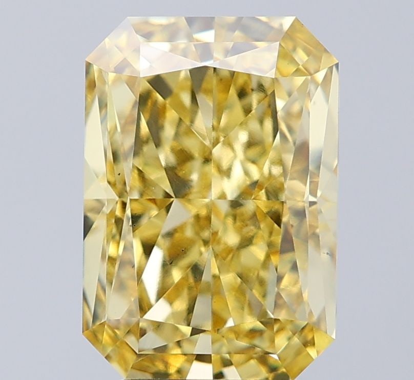 Loose Diamond - RADIANT 5.06ct Fancy Vivid Yellow VS2: Loose Diamond - RADIANT 5.06ct Fancy Vivid Yellow VS2 Source: This is a real non-mined Diamond that has been grown in a lab Shape: RADIANT Carats: 5.06 Color: Fancy Vivid Yellow Certification: IGI Vid