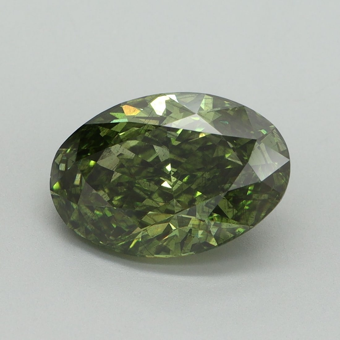Loose Diamond - OVAL 3.23ct Fancy Vivid Green SI2: Loose Diamond - OVAL 3.23ct Fancy Vivid Green SI2 Source: This is a real non-mined Diamond that has been grown in a lab Shape: OVAL Carats: 3.23 Color: Fancy Vivid Green Certification: IGI Video: