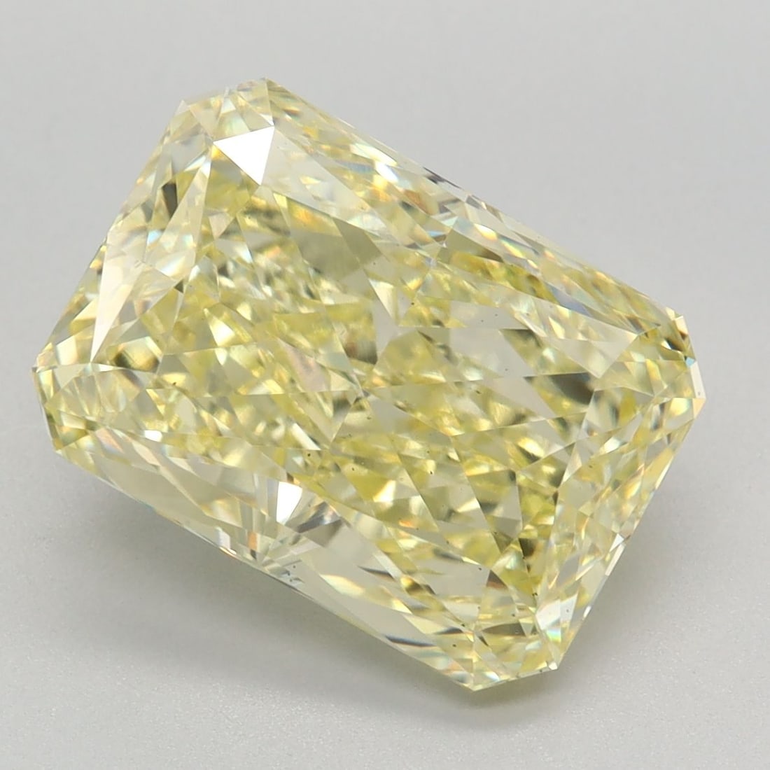Loose Diamond - RADIANT 4.61ct Fancy Vivid Yellow VS2: Loose Diamond - RADIANT 4.61ct Fancy Vivid Yellow VS2 Source: This is a real non-mined Diamond that has been grown in a lab Shape: RADIANT Carats: 4.61 Color: Fancy Vivid Yellow Certification: IGI Vid