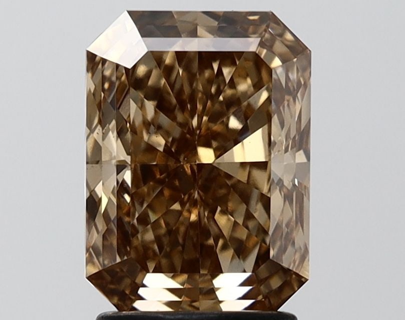 Loose Diamond - RADIANT 2.6ct Fancy Light Brown VS2: Loose Diamond - RADIANT 2.6ct Fancy Light Brown VS2 Source: This is a real non-mined Diamond that has been grown in a lab Shape: RADIANT Carats: 2.6 Color: Fancy Light Brown Certification: IGI Video: