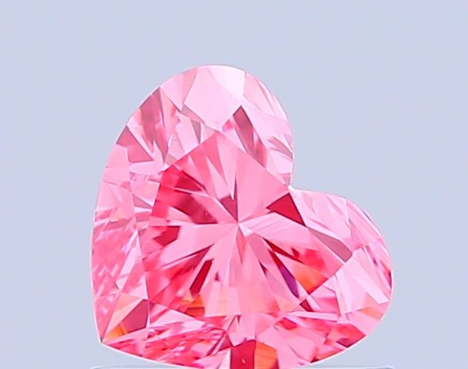 Loose Diamond - HEART 0.76ct Fancy Vivid Pink VVS2: Loose Diamond - HEART 0.76ct Fancy Vivid Pink VVS2 Source: This is a real non-mined Diamond that has been grown in a lab Shape: HEART Carats: 0.76 Color: Fancy Vivid Pink Certification: IGI Video: