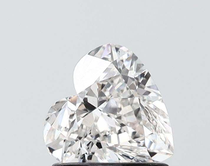 Loose Diamond - HEART 0.97ct D VS2: Loose Diamond - HEART 0.97ct D VS2 Source: This is a real non-mined Diamond that has been grown in a lab Shape: HEART Carats: 0.97 Color: D Clarity: VS2 Certification: NONE Video: