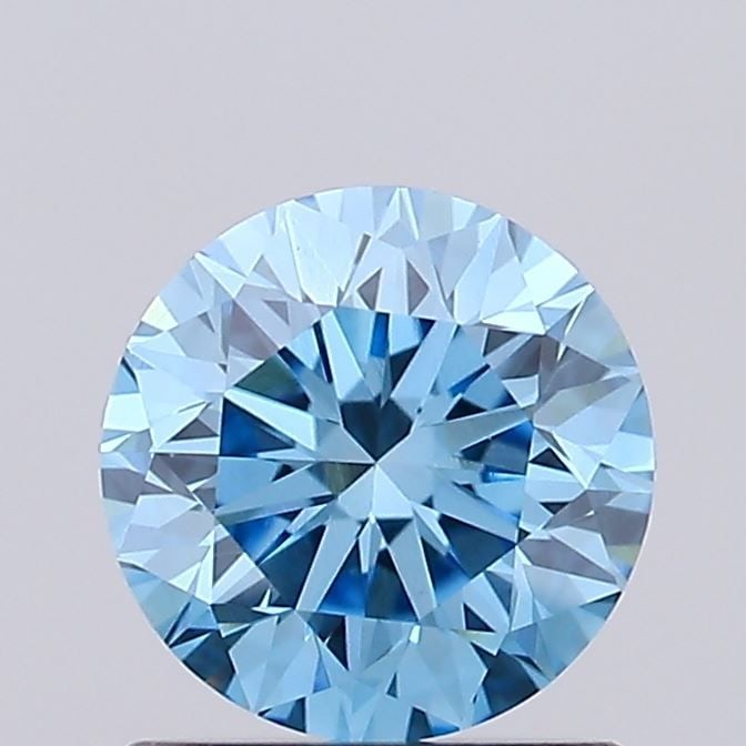 Loose Diamond - ROUND 0.94ct Fancy Vivid Blue VS1: Loose Diamond - ROUND 0.94ct Fancy Vivid Blue VS1 Source: This is a real non-mined Diamond that has been grown in a lab Shape: ROUND Carats: 0.94 Color: Fancy Vivid Blue Certification: IGI Video: