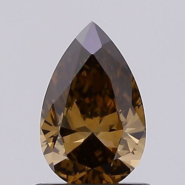 Loose Diamond - PEAR 0.69ct Fancy Brown VS1: Loose Diamond - PEAR 0.69ct Fancy Brown VS1 Source: This is a real non-mined Diamond that has been grown in a lab Shape: PEAR Carats: 0.69 Color: Fancy Brown Certification: IGI The Diamond Depot
