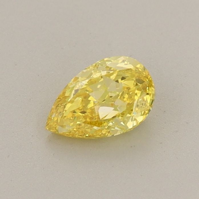 Loose Diamond - PEAR 0.38ct Fancy Vivid Yellow VS2: Loose Diamond - PEAR 0.38ct Fancy Vivid Yellow VS2 Source: This is a real non-mined Diamond that has been grown in a lab Shape: PEAR Carats: 0.38 Color: Fancy Vivid Yellow Certification: IGI Video: