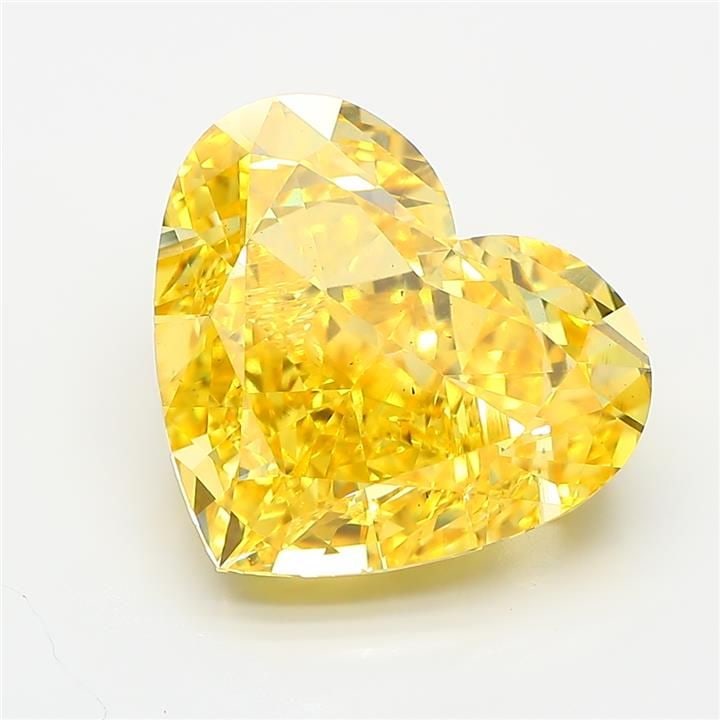 Loose Diamond - HEART 9.63ct Fancy Vivid Yellow VS2: Loose Diamond - HEART 9.63ct Fancy Vivid Yellow VS2 Source: This is a real non-mined Diamond that has been grown in a lab Shape: HEART Carats: 9.63 Color: Fancy Vivid Yellow Certification: IGI Video:
