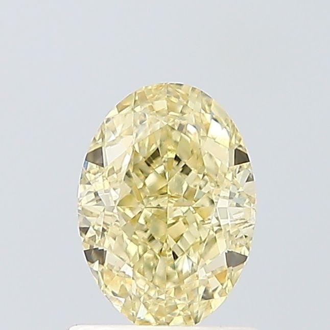 Loose Diamond - OVAL 1.05ct Fancy Yellow VS2: Loose Diamond - OVAL 1.05ct Fancy Yellow VS2 Source: This is a real non-mined Diamond that has been grown in a lab Shape: OVAL Carats: 1.05 Color: Fancy Yellow Certification: IGI Video: