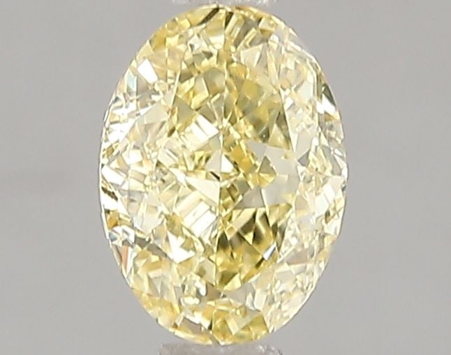 Loose Diamond - OVAL 1.02ct Fancy Vivid Yellow VS2: Loose Diamond - OVAL 1.02ct Fancy Vivid Yellow VS2 Source: This is a real non-mined Diamond that has been grown in a lab Shape: OVAL Carats: 1.02 Color: Fancy Vivid Yellow Certification: IGI Video: