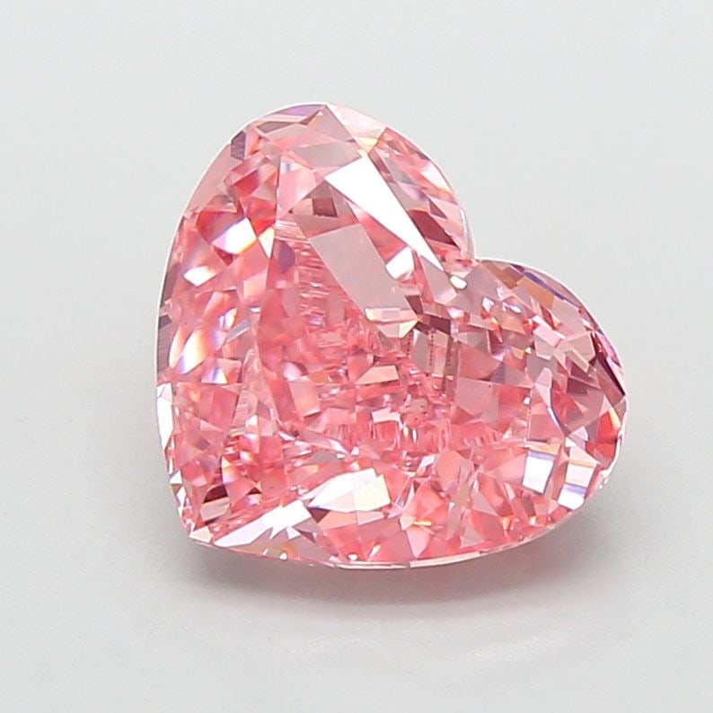 Loose Diamond - HEART 3.02ct Fancy Vivid Pink VS1: Loose Diamond - HEART 3.02ct Fancy Vivid Pink VS1 Source: This is a real non-mined Diamond that has been grown in a lab Shape: HEART Carats: 3.02 Color: Fancy Vivid Pink Certification: IGI Video: