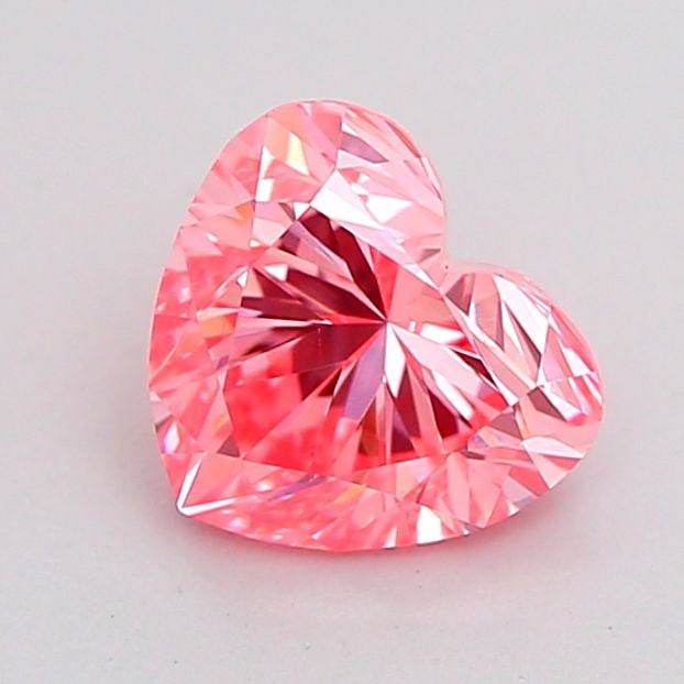 Loose Diamond - HEART 1.0ct Fancy Vivid Pink VVS2: Loose Diamond - HEART 1.0ct Fancy Vivid Pink VVS2 Source: This is a real non-mined Diamond that has been grown in a lab Shape: HEART Carats: 1.0 Color: Fancy Vivid Pink Certification: IGI Video: