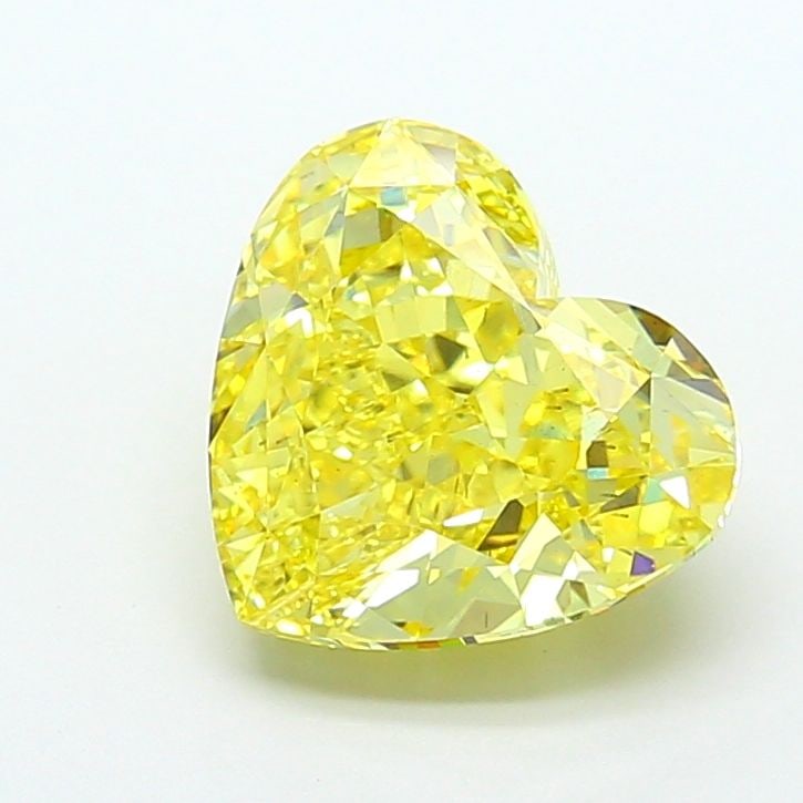 Loose Diamond - HEART 5.02ct Fancy Vivid Yellow VS2: Loose Diamond - HEART 5.02ct Fancy Vivid Yellow VS2 Source: This is a real non-mined Diamond that has been grown in a lab Shape: HEART Carats: 5.02 Color: Fancy Vivid Yellow Certification: IGI Video: