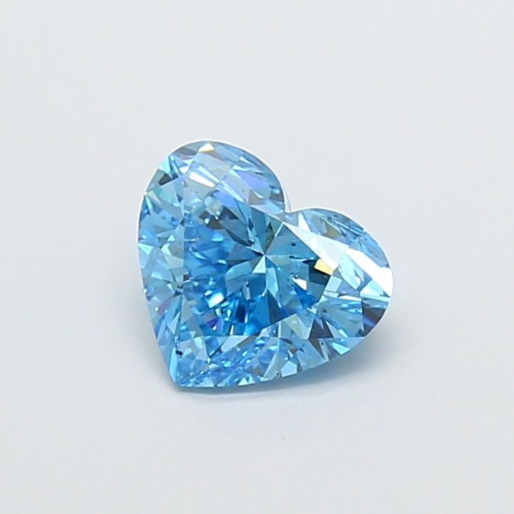 Loose Diamond - HEART 1.01ct Fancy Vivid Blue SI1: Loose Diamond - HEART 1.01ct Fancy Vivid Blue SI1 Source: This is a real non-mined Diamond that has been grown in a lab Shape: HEART Carats: 1.01 Color: Fancy Vivid Blue Certification: IGI The Diamond