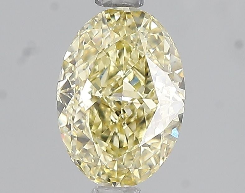 Loose Diamond - OVAL 1.56ct Fancy Yellow VS1: Loose Diamond - OVAL 1.56ct Fancy Yellow VS1 Source: This is a real non-mined Diamond that has been grown in a lab Shape: OVAL Carats: 1.56 Color: Fancy Yellow Certification: IGI Video: